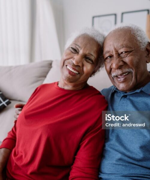 Portrait of an elderly couple at home.